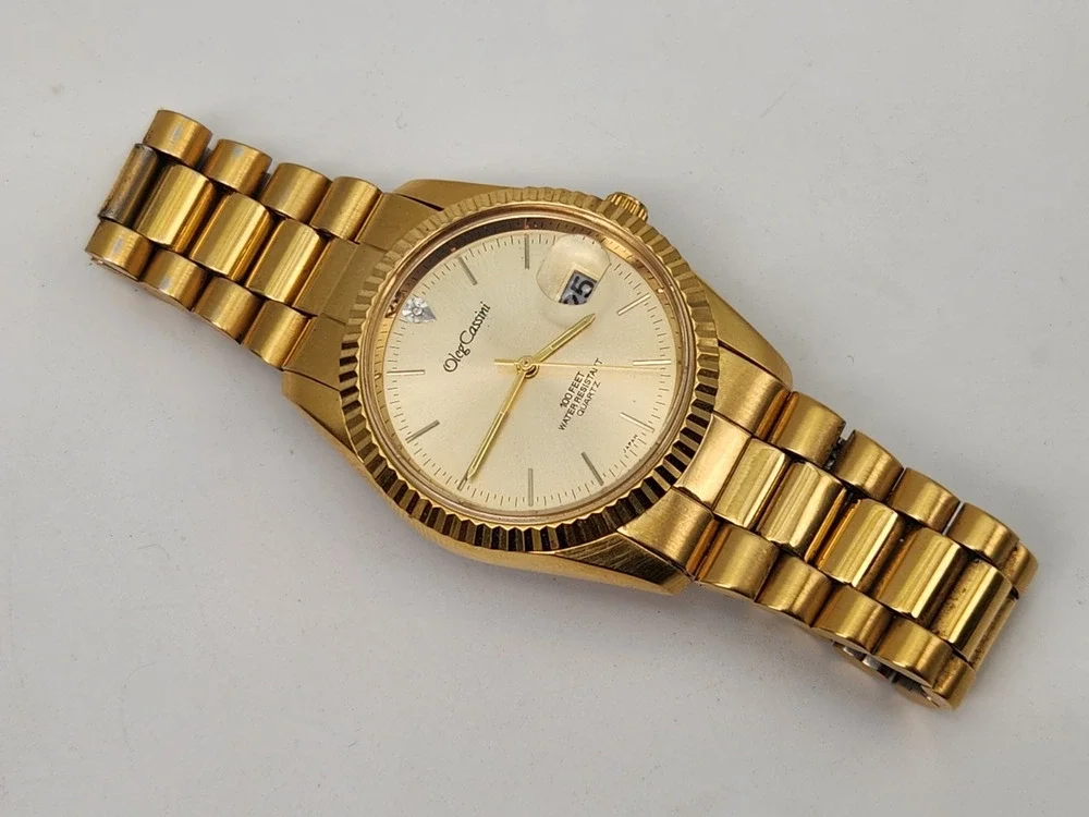 Oleg Cassini 31-727DG Diamond Gold Tone 100 FT WR Quartz Watch